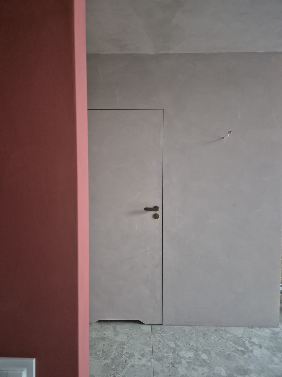 Warm Clay limewash paint color applied on an interior wall