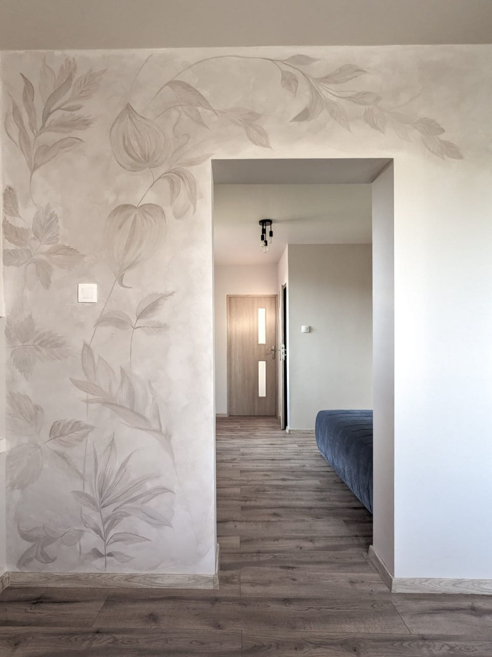 Warm Limestone limewash paint color applied on an interior wall