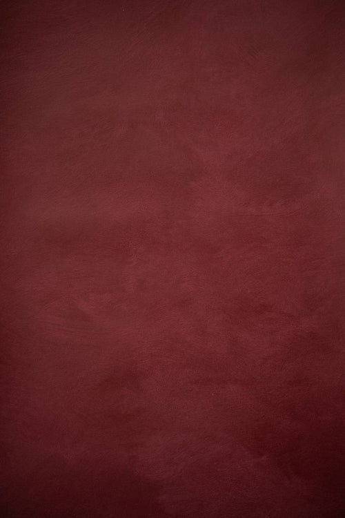 #13 Cherry Ember Alkantarus suede-effect paint on a wall