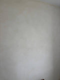 Almond Cream limewash paint on interior wall, real photo