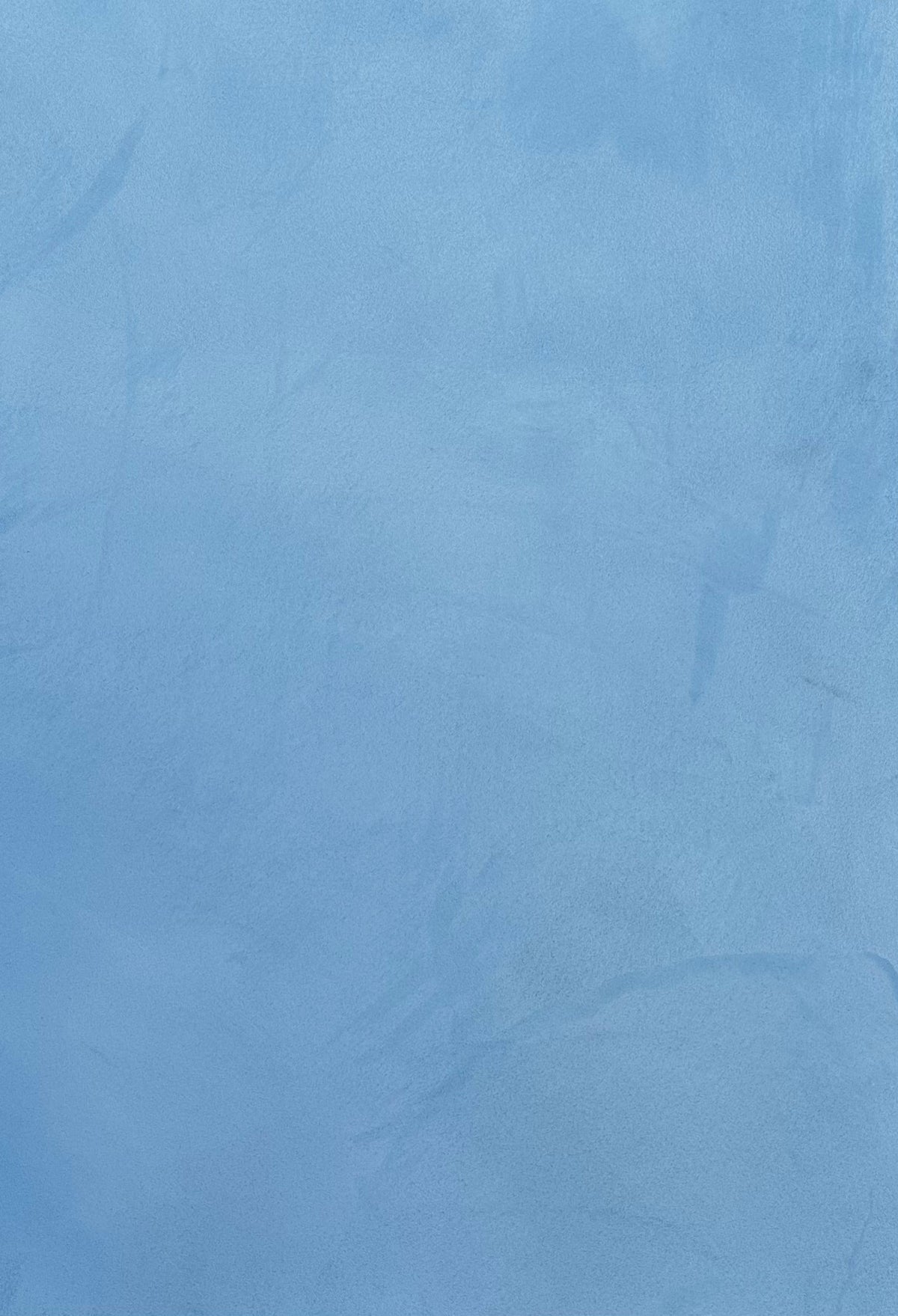 Baby Blue Marmorinus lime plaster, close-up of the marble-effect texture