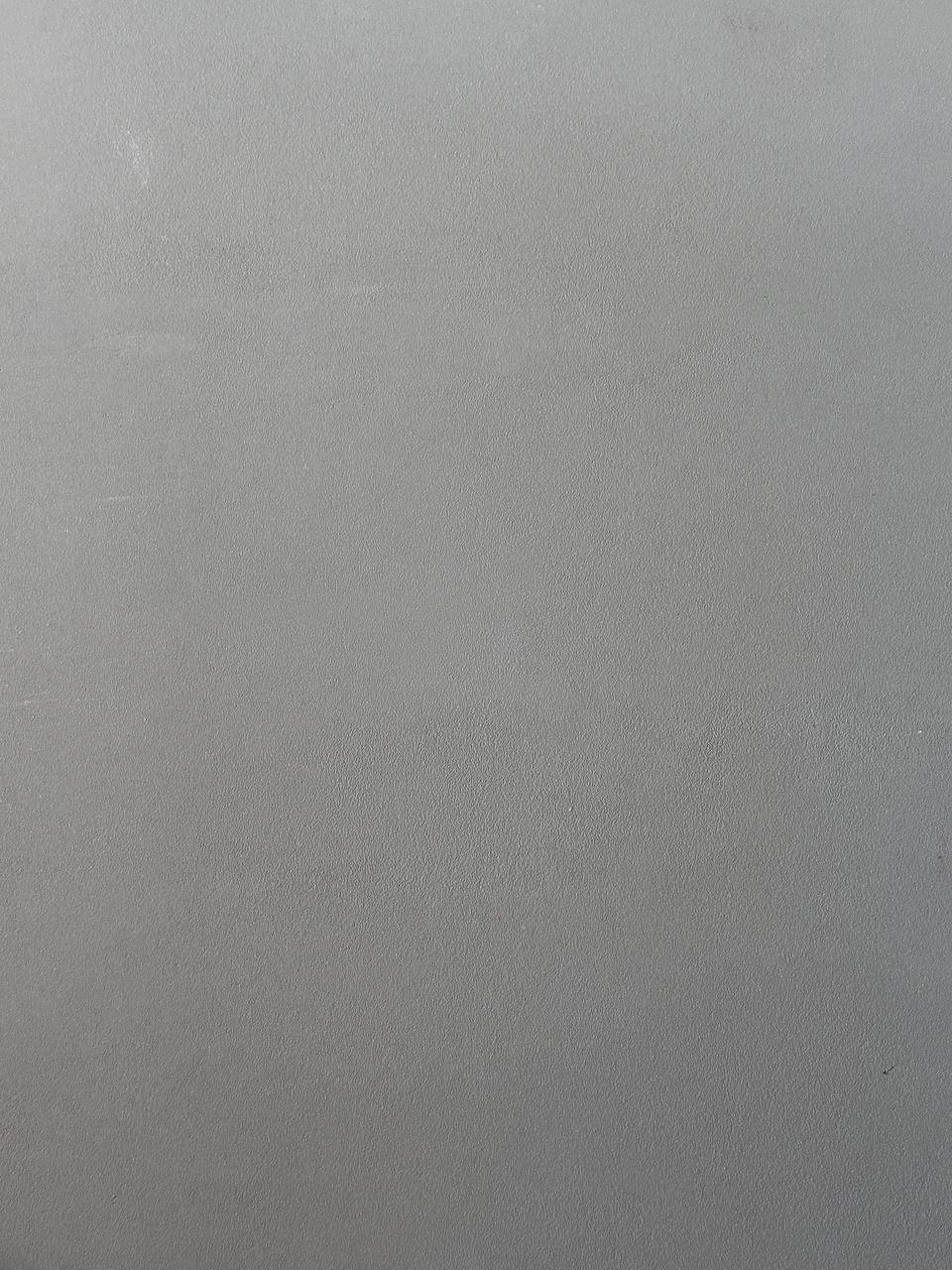 #6 Sand Limestone Romanus clay plaster on a wall, close-up of the matte texture