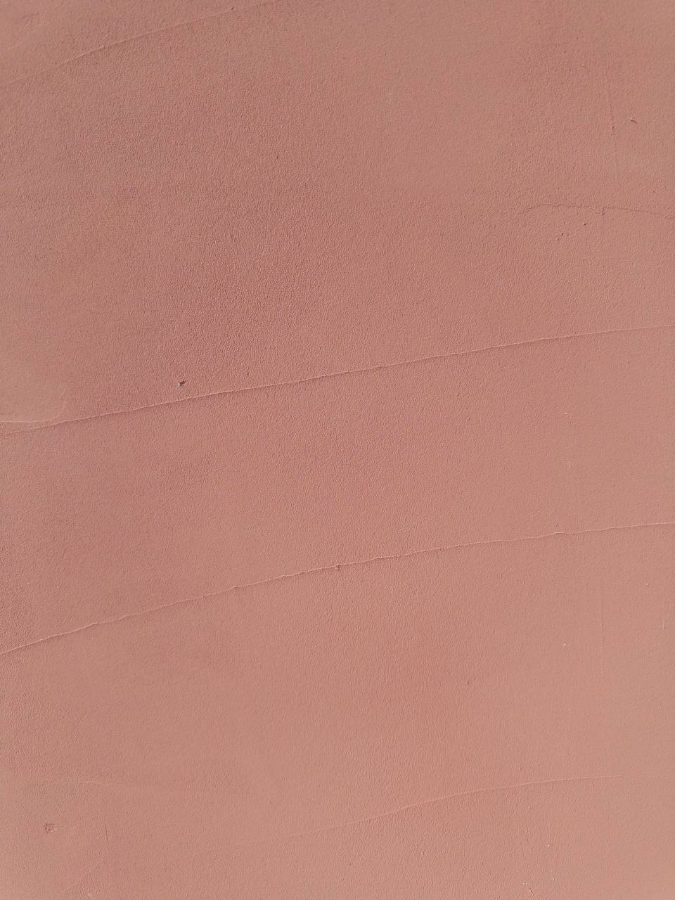 #9 Desert Rose Romanus clay plaster on a wall, close-up of the matte texture