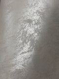 #0 Alabaster Mist Saharus sand-effect paint on a wall
